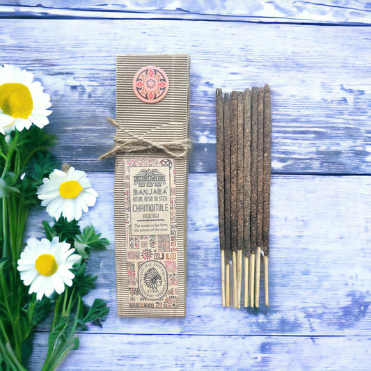 Handcrafted incense stick coated in natural chamomile resin, ideal for creating a calming aromatherapy environment.