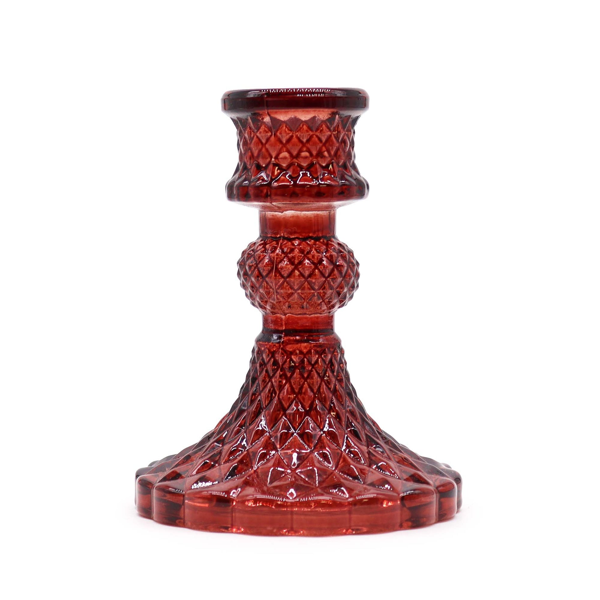 Elegant vintage style glass dinner candle holder in a deep translucent vampire red finish.