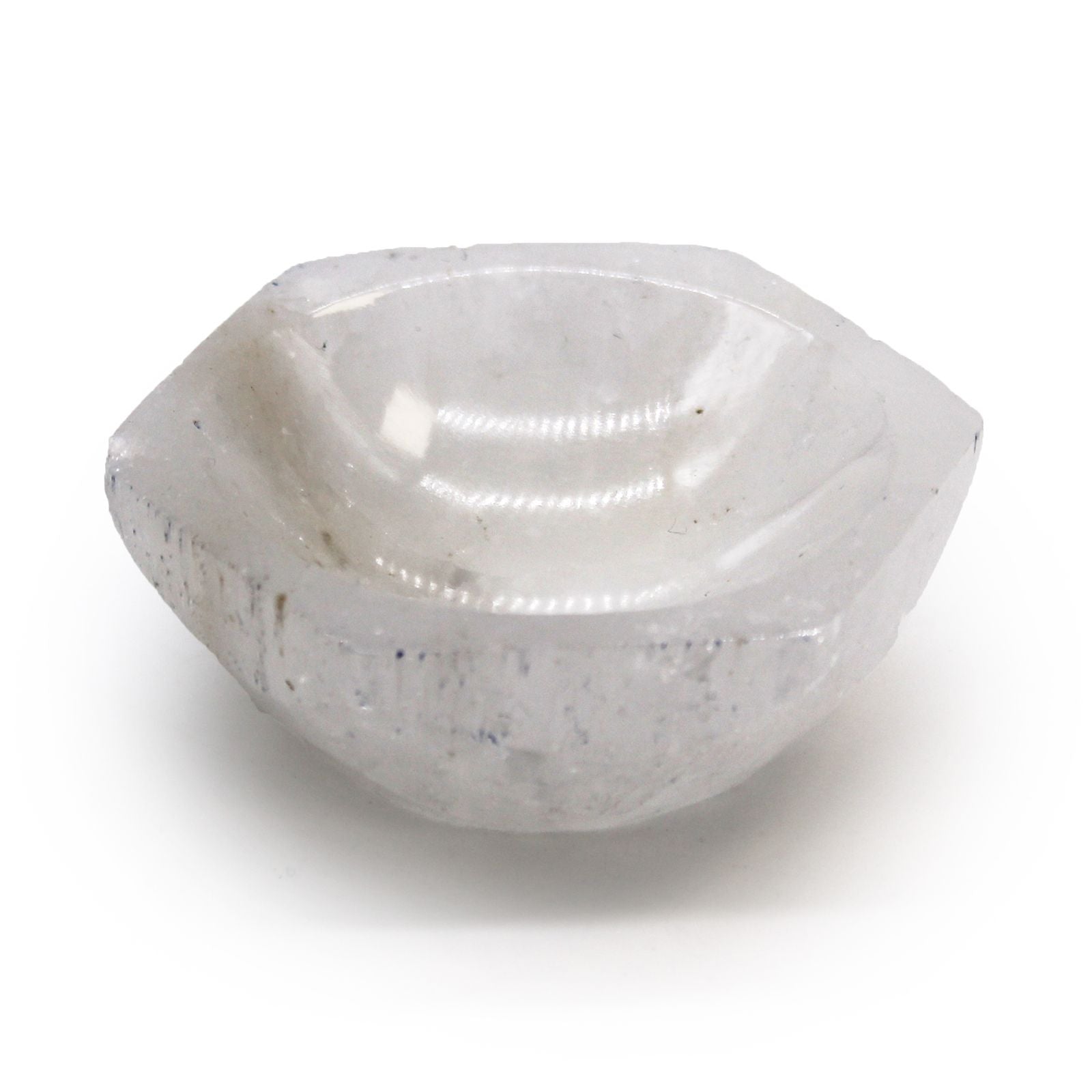 Small polished white selenite bowl in a hexagonal shape with a smooth translucent finish.