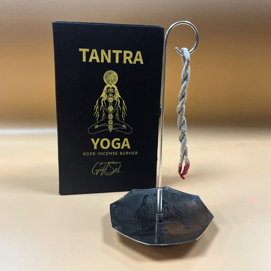 Hand-rolled rope incense bundle with a circular silver-plated holder featuring embossed seven chakra symbols.