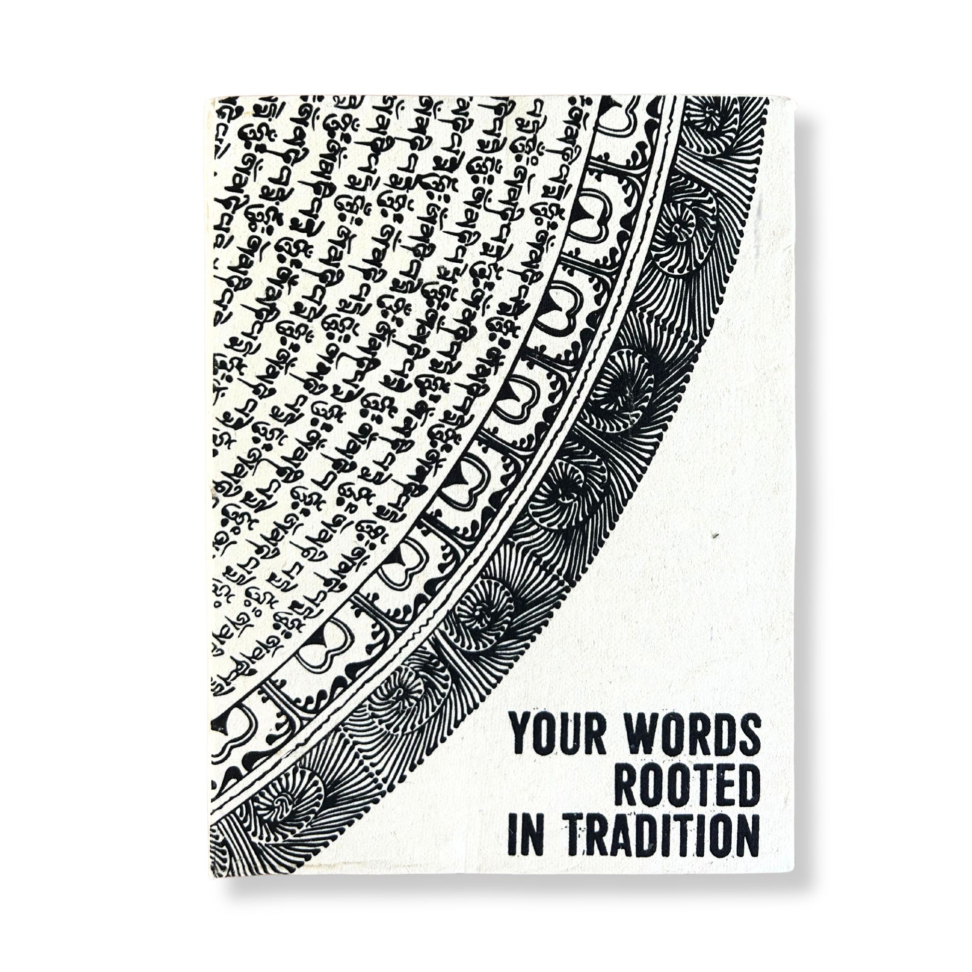 Large handmade lokta paper notebook with a black and white tribal design and bookmark.