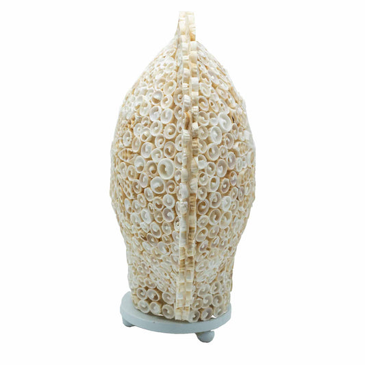 Large round boho style lamp crafted from intricate cut white sea shells creating a warm decorative glow.