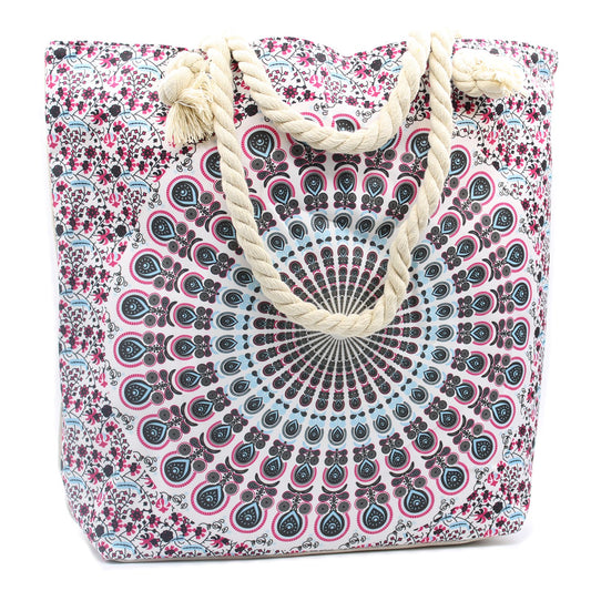 Vibrant electric blue tote bag featuring a white mandala pattern and thick cream rope handles.