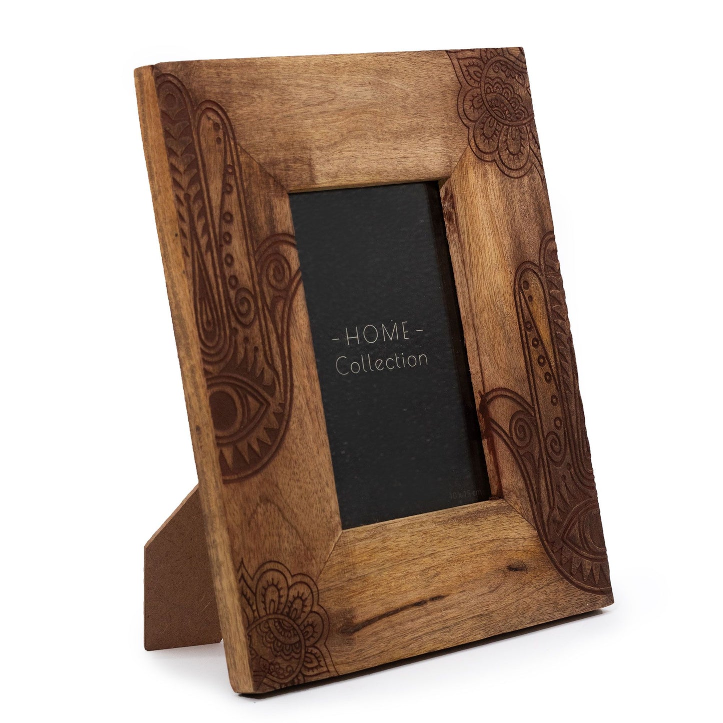 Handcrafted medium black mango wood picture frame with a minimalist design for 10x15cm photos.