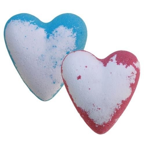 Two heart-shaped pink and white fizzy bath bombs with a textured surface on a plain background.