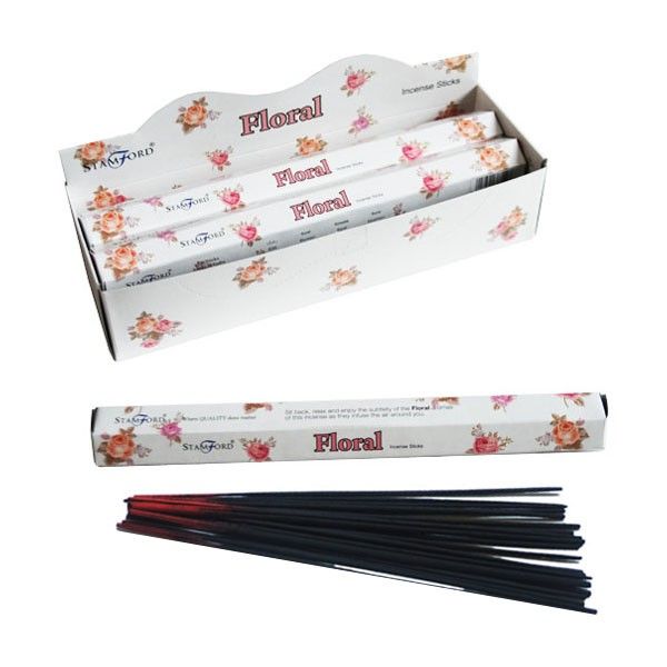 Hexagonal box of premium floral incense sticks with delicate floral designs on a white background.