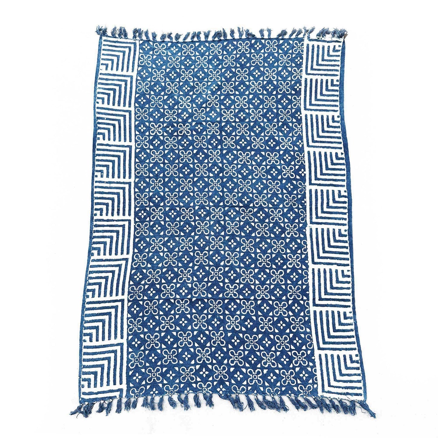 Handmade indigo cotton throw featuring an intricate geometric Kasba Tiles pattern in deep blue and white.