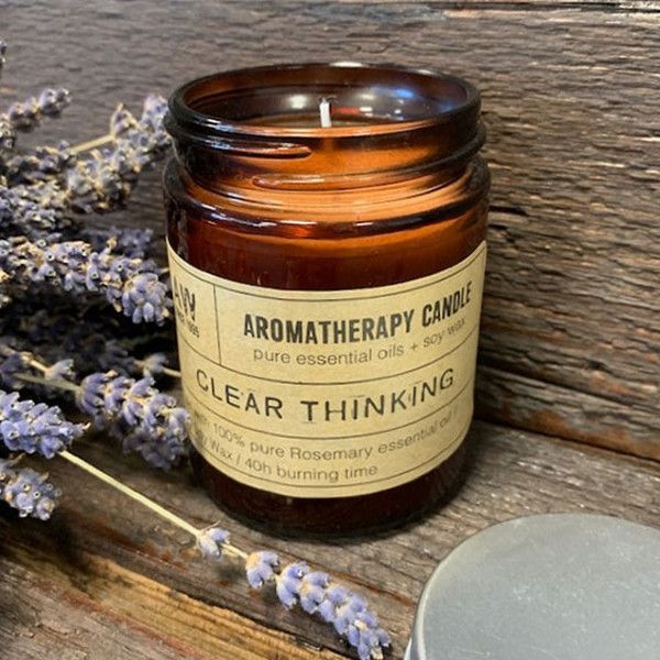 Hand-poured clear thinking aromatherapy candle in a glass jar with natural soy wax and pure essential oils.