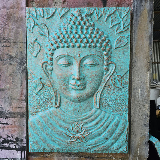 Large turquoise Buddha relief with intricate detailing set within a rectangular black iron frame.