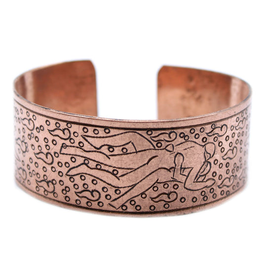 Adjustable copper Tibetan bracelet featuring intricate traditional mantra engravings and Eastern spiritual designs.