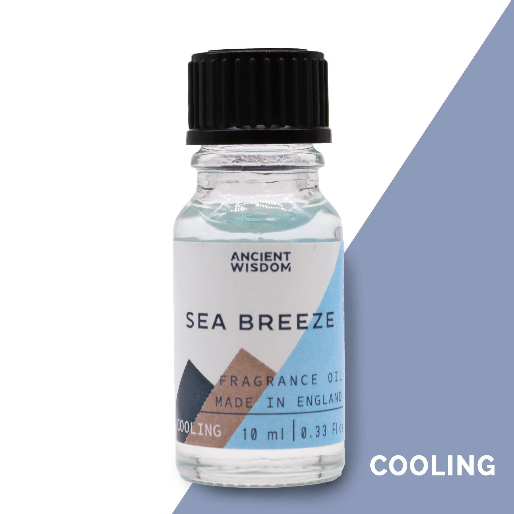 A 10ml glass bottle of Sea Breeze fragrance oil with a blue label featuring a wave design.