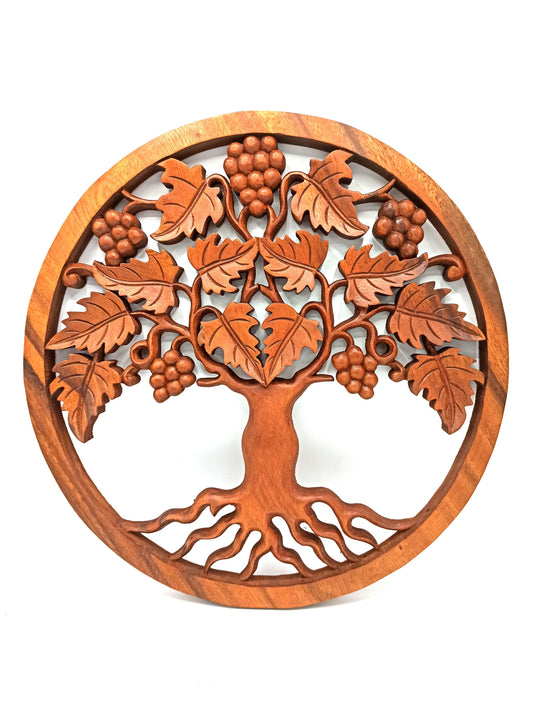 Intricately carved circular wooden wall panel featuring a Tree of Life design with grape clusters and leafy vines.