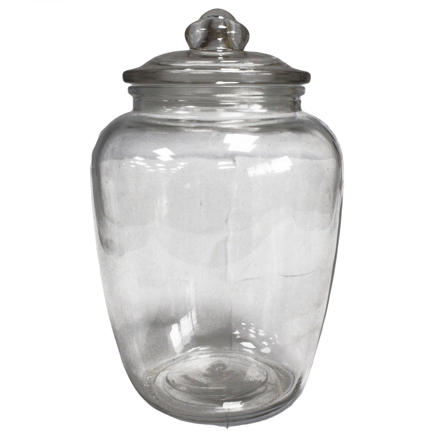 Large classic clear glass candy jar with a rounded body and matching glass lid in a simple elegant design.