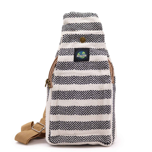 Eco-friendly natural cotton cross-body bag in a black and white design with a durable black nylon strap.