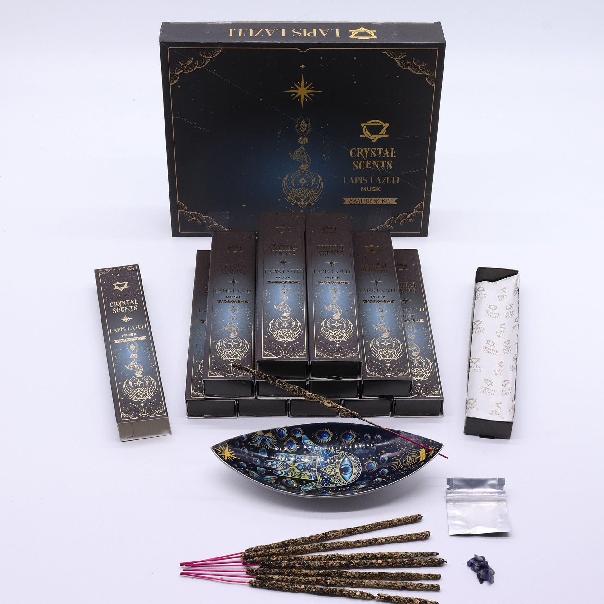 Handcrafted musk smudge incense sticks featuring blue lapis lazuli crystal chipstones in a decorative box.