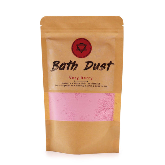 Vibrant pink and purple scented bath dust in a clear bag showing a fine crystalline texture.