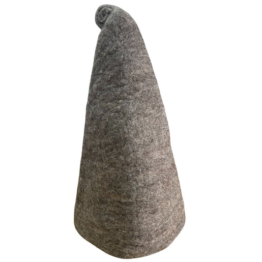 Handcrafted felted wool sauna hat in natural brown with a whimsical pointed wizard design.
