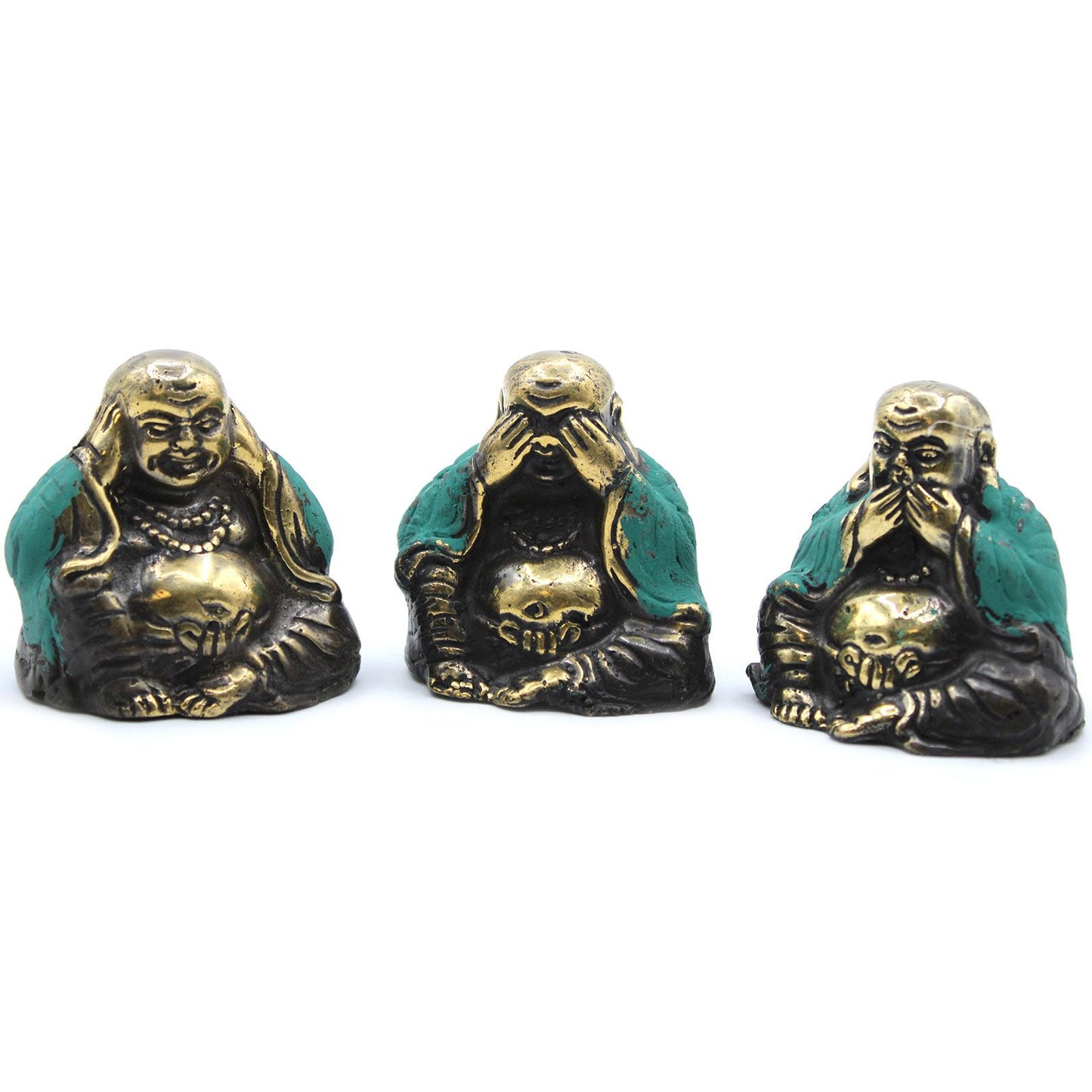 Three small brass Buddha statues in 'see no evil, hear no evil, speak no evil' poses on a plain background.