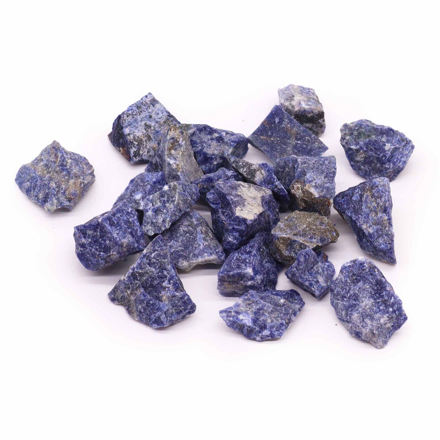 A collection of rough, unpolished Sodalite crystals showing rich blue hues and white mineral veining.