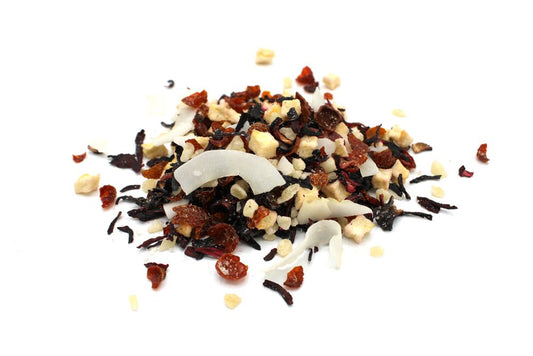 Large 1kg bag of loose leaf fruit tea featuring dried pineapple chunks, coconut chips, and hibiscus petals.