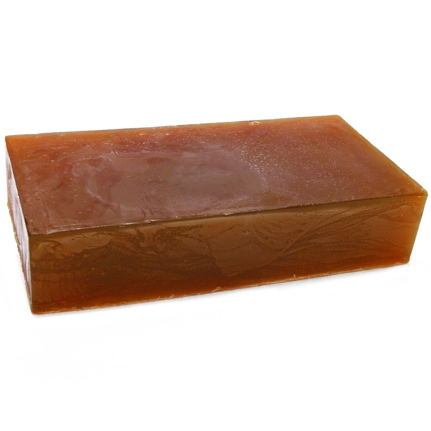Large artisanal soap loaf textured with dried botanicals, featuring a rich natural brown and cream marbled design.