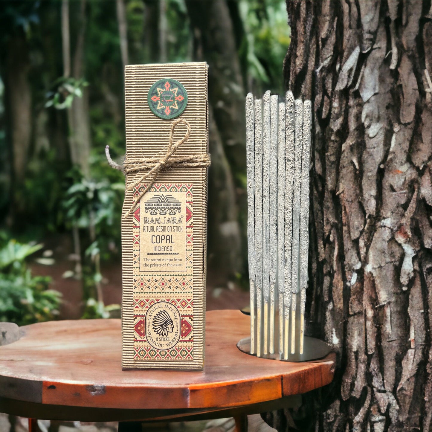 A handcrafted incense stick coated in natural copal resin, releasing a light aromatic smoke for ritual and meditation.