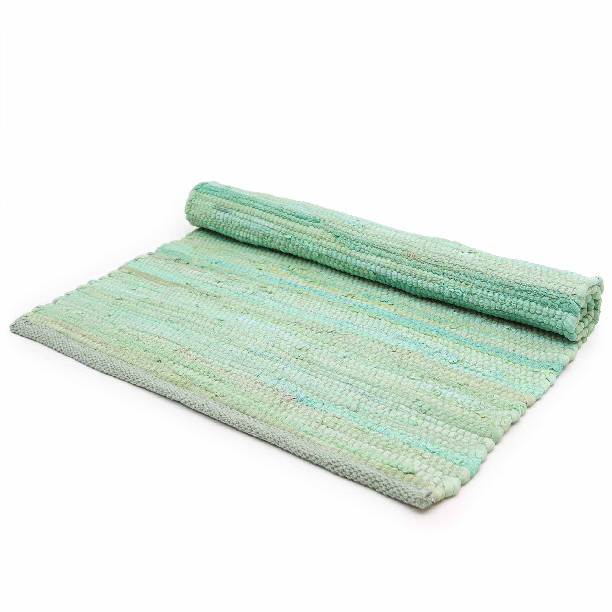 Large handwoven rectangular cotton rug in a vibrant aqua blue colour with a textured flatweave finish.