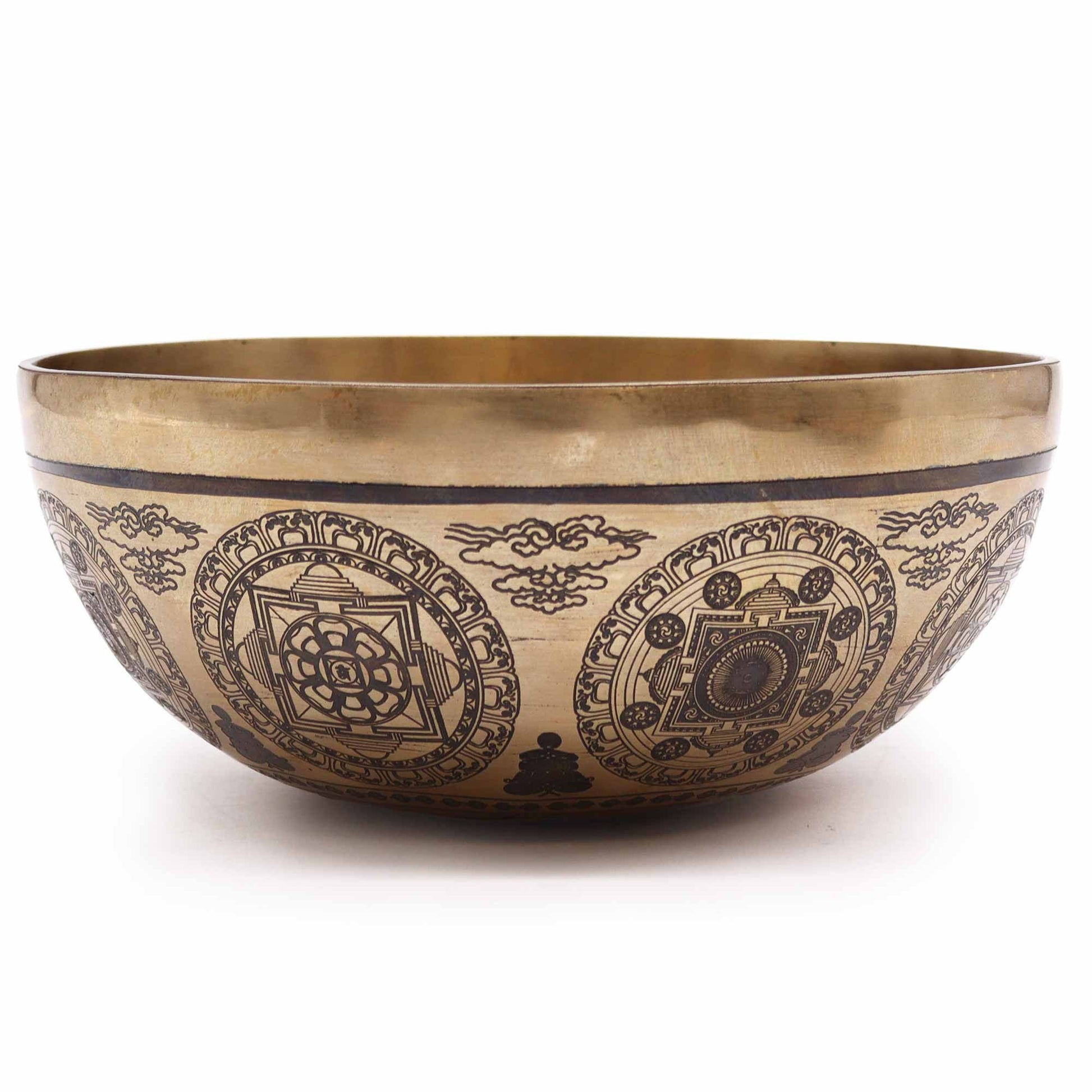 Large hand-engraved Tibetan singing bowl with sacred 7 Chakra and Flower of Life symbols on a metallic finish.