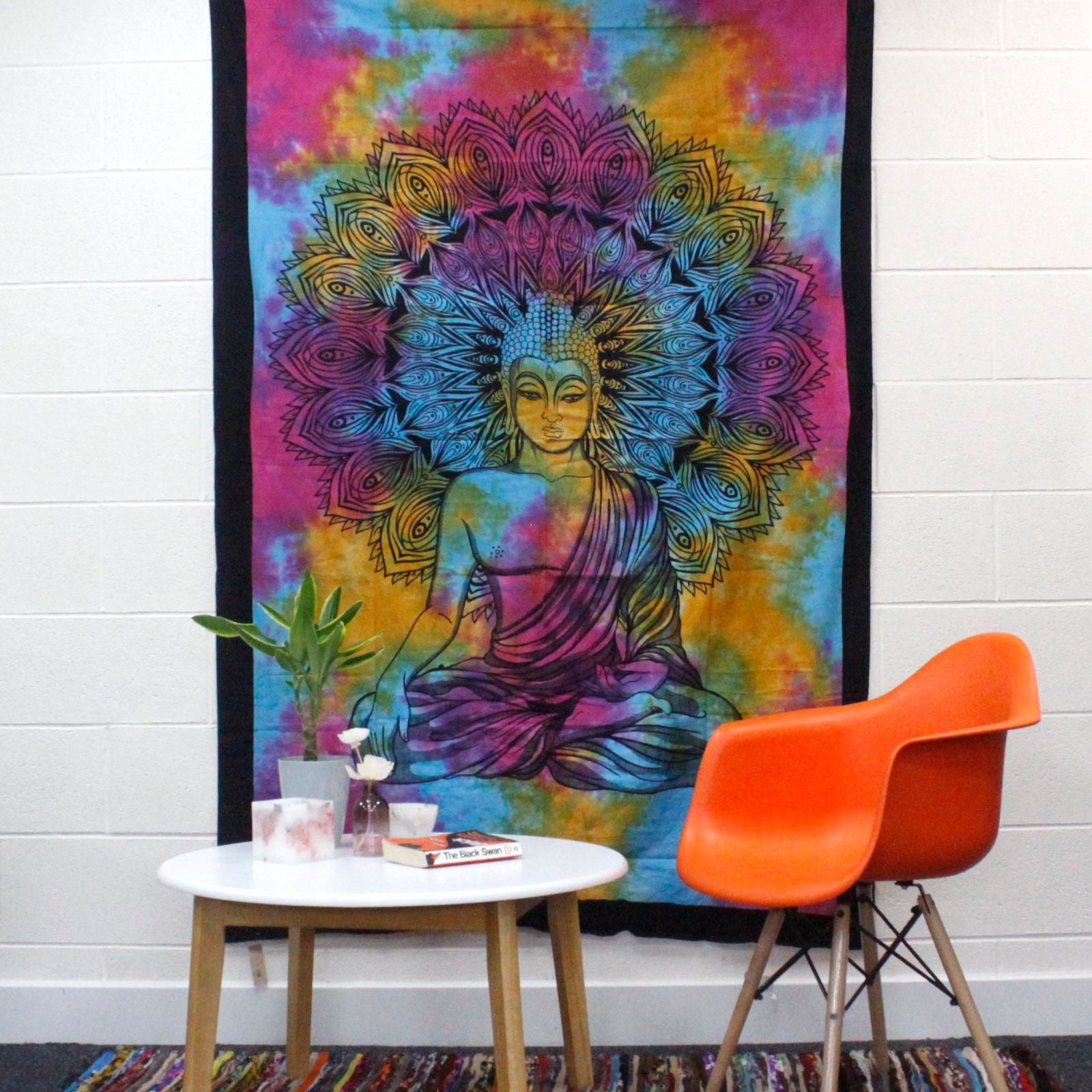 Single cotton bedspread featuring a peaceful Buddha design, suitable for use as a decorative wall hanging.