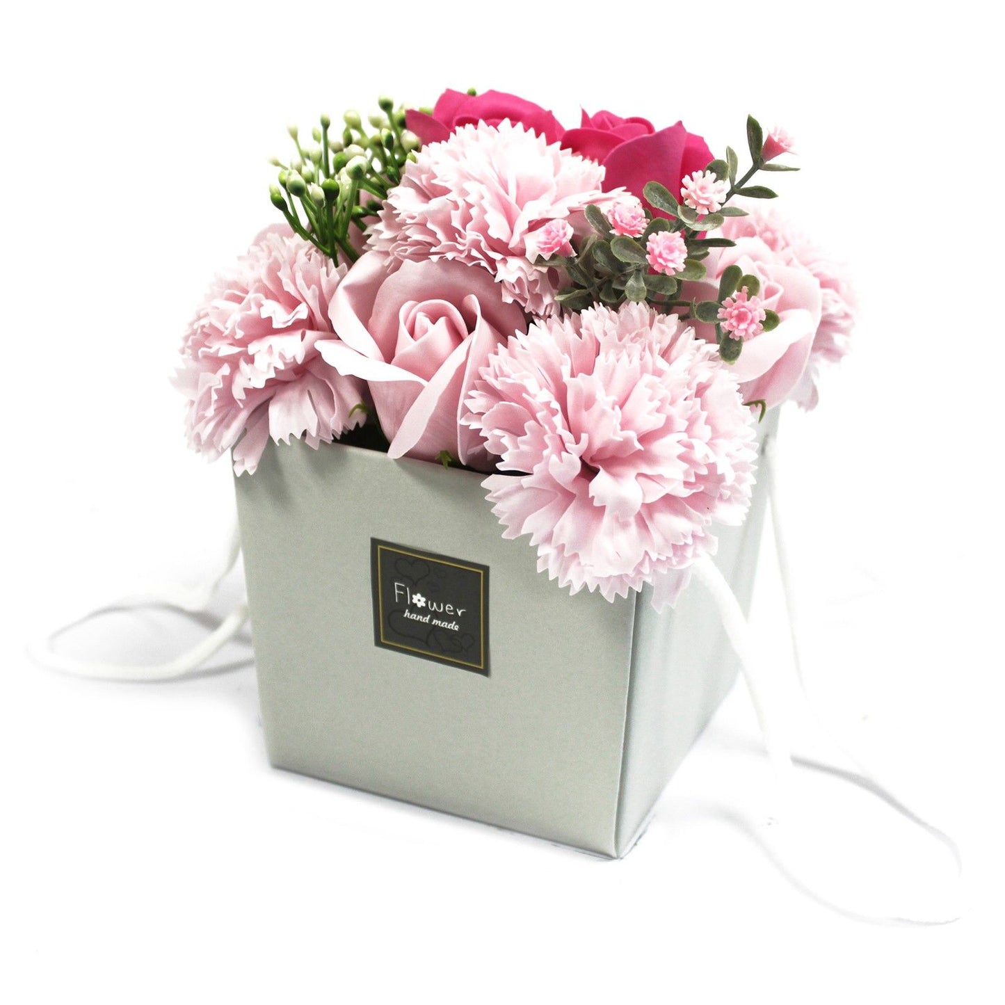 Beautifully arranged bouquet of realistic pink rose and carnation soap flowers in a decorative gift box.
