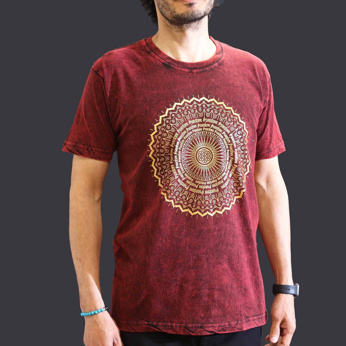 Medium maroon stonewashed t-shirt featuring a large intricate mandala design on the front.