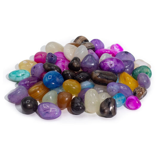 A collection of polished tumbled agate stones in vibrant shades of purple, blue, green, and pink.