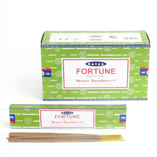A pack of hand-rolled Fortune incense sticks displaying vibrant packaging on a neutral background.