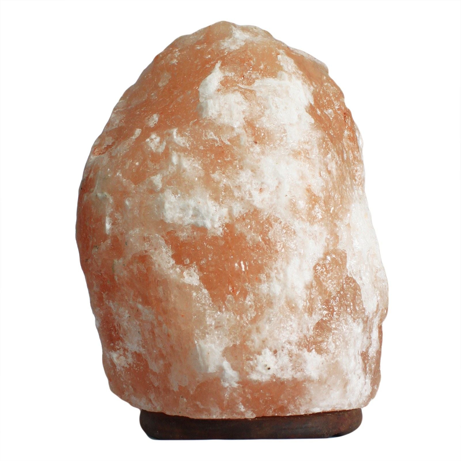 Large, natural-cut orange Himalayan salt lamp on a wooden base, emitting a warm ambient glow.