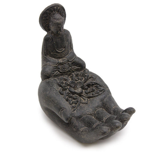 Sleek black stone incense burner featuring a Buddha head and a cupped hand design for holding incense sticks.