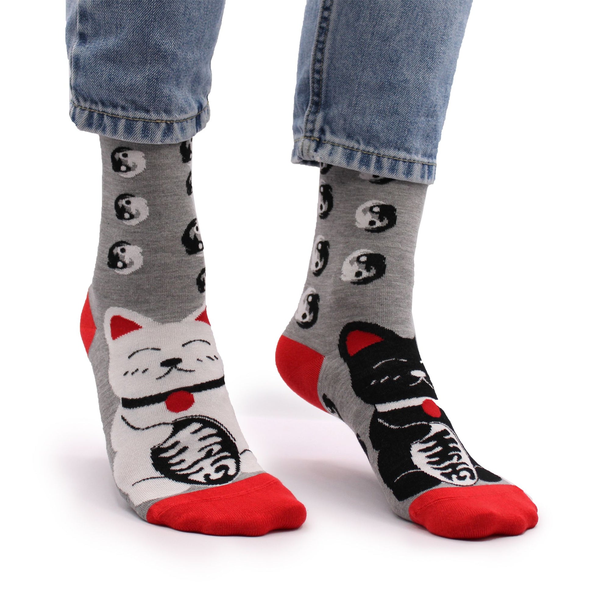 Pair of soft bamboo socks featuring a charming lucky cat pattern in a comfortable small to medium fit.