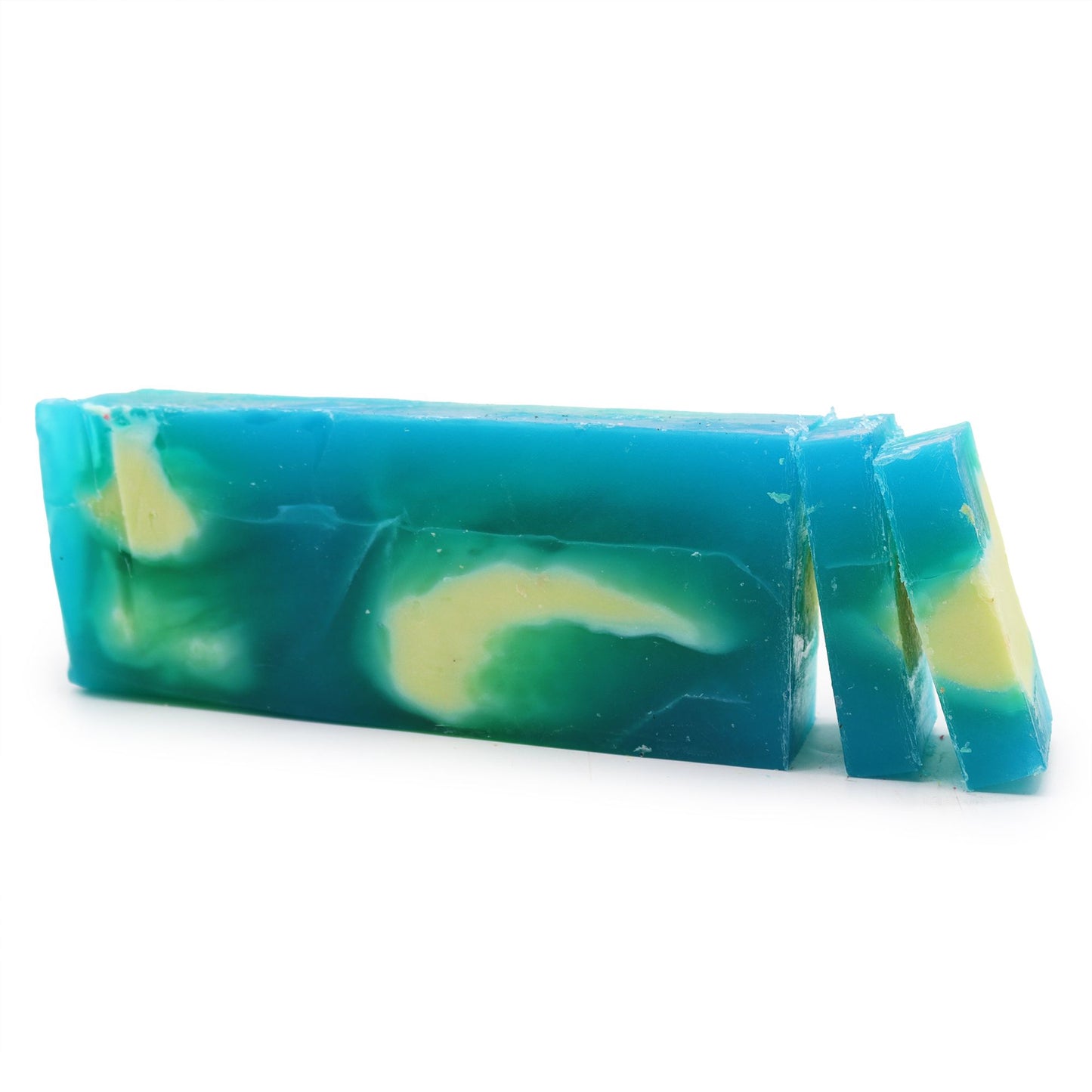 A rustic, handmade rosemary and olive oil soap loaf with a natural, textured green and cream finish.