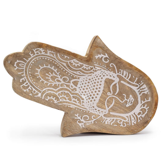 Long whitewashed wooden tray in a Hamsa hand shape with a detailed Buddha carving in the centre.