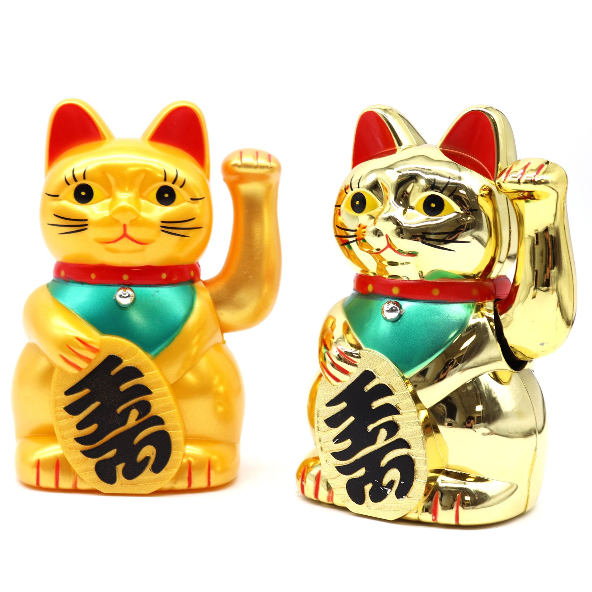 Classic gold Maneki Neko lucky waving cat figurine with a moving left paw on a red base.