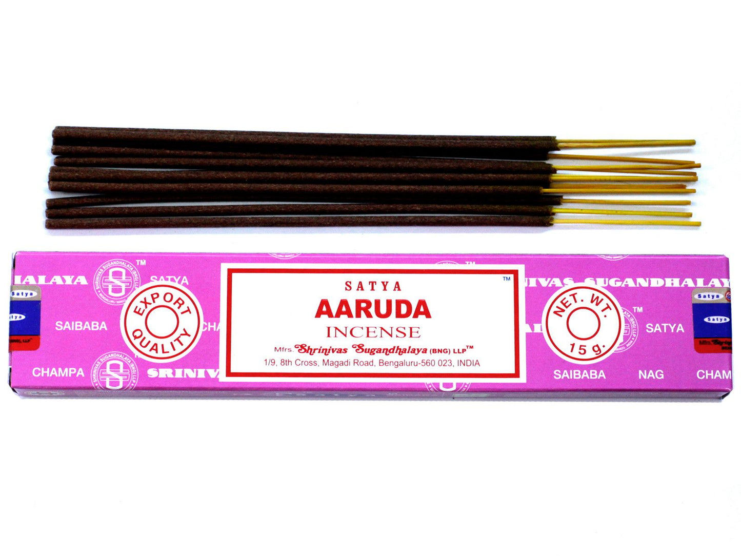 Hand-rolled incense sticks with a natural finish, releasing a delicate plume of aromatic smoke in a serene setting.