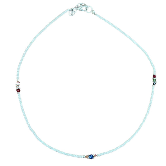 Exquisite handmade necklace featuring luminous white pearls and intricately faceted clear beads.