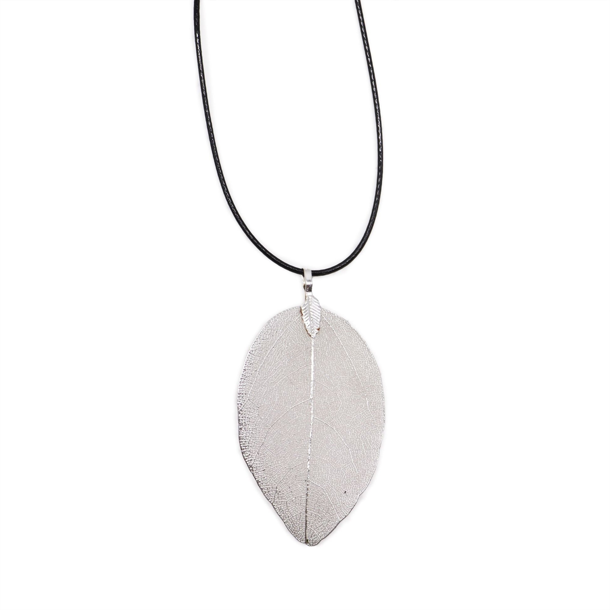 Delicate silver-plated real leaf necklace showing intricate natural vein patterns on a fine chain.