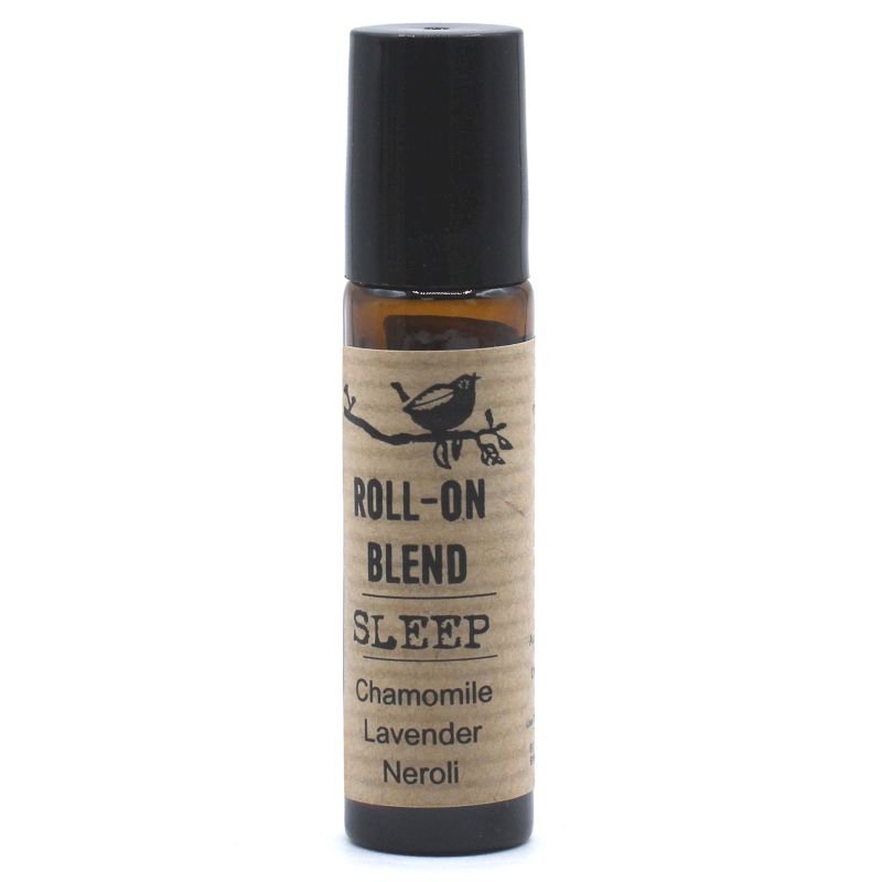 Small amber glass roll-on bottle with a black cap, containing a clear essential oil blend for sleep.