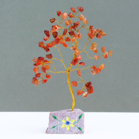 Handmade Carnelian gemstone tree with eighty orange crystal beads on adjustable wire branches with a mineral rock base.