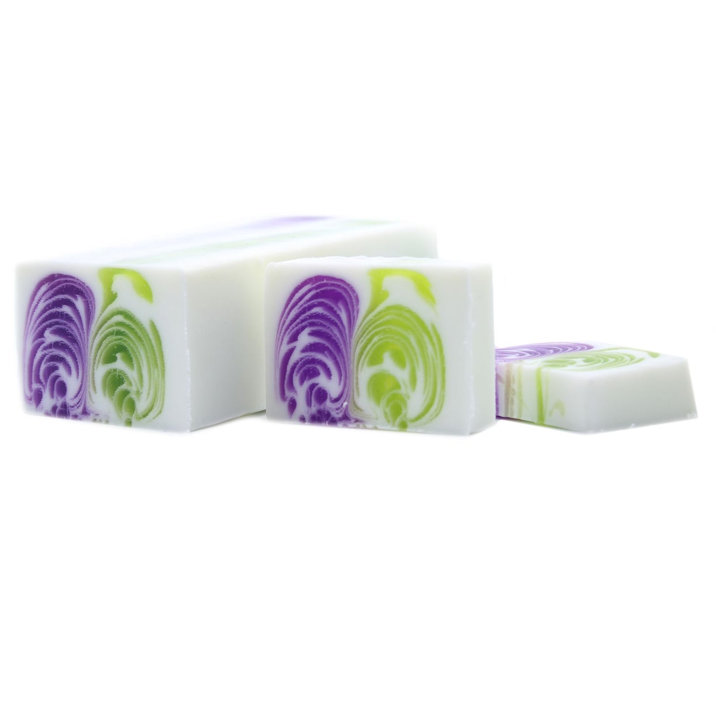 Large artisanal soap loaf with a vibrant purple dewberry hue and textured handcrafted top.