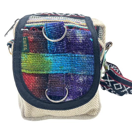 Handcrafted hemp messenger bag featuring a vibrant multi-coloured tie-dye pattern and adjustable shoulder strap.