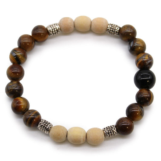Handcrafted Balinese style bangle featuring white, black and grey beads representing balance and strength.