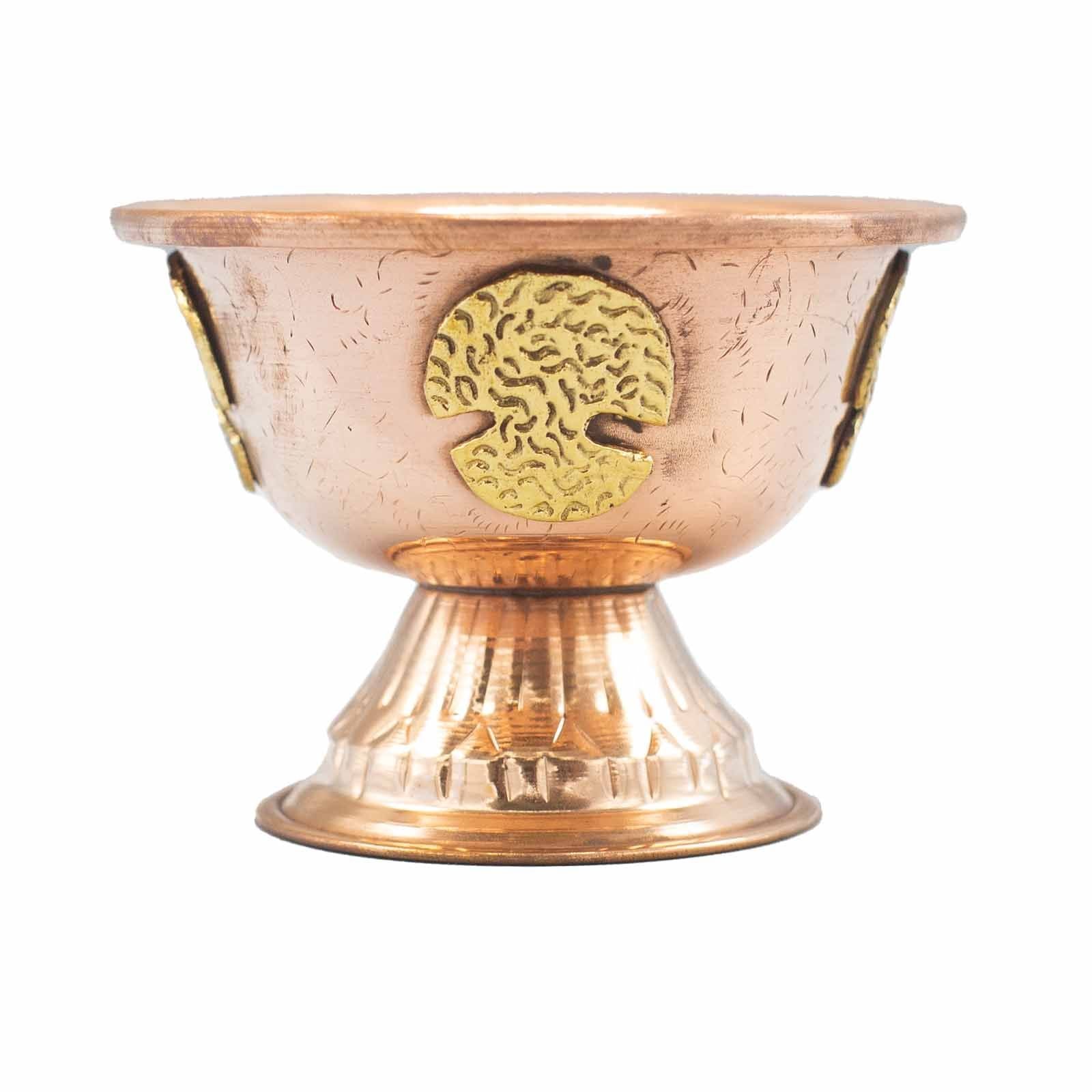 Handcrafted copper ritual chalice engraved with a detailed Tree of Life pattern for altar use.