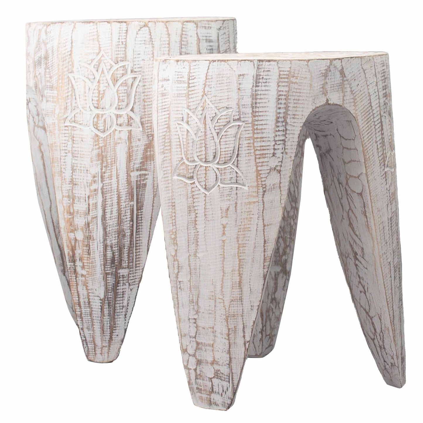 Pair of cylindrical wooden stools with an interlocking carved design and a light whitewash finish.