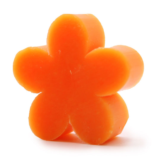 Set of ten vibrant orange flower-shaped guest soaps with a delicate textured petal design.